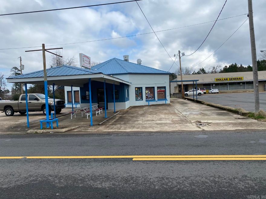 * Seller is very motivated!! Make an offer!!  The key to good business is location. This location will get your name out there! The building is awesome the front makes a great dining area for a restaurants of a great display area for any other type of business. There is a nice sitting area outside that would make great for outside dinning. This property has 2 special areas for cooking or food preparation. Already equipped with electric, gas, and water hook ups. There is a storage area up stars, along with a office, and laundry hookups. The property has 2 drive up windows, one located on each side of the building. There is a service door (like large roll up garage door) located in the back to make unloading easy. Coming with the building is also a hook up for carbonated drink fountain. The front great room is full of large windows for a great street view, and the floor is so clean you can see yourself in it! This is a very clean and well taken care of building. The owners have freshly repainted the outside of the building and is ready to go!  Lot size, year built, and square footage taken from courthouse records.