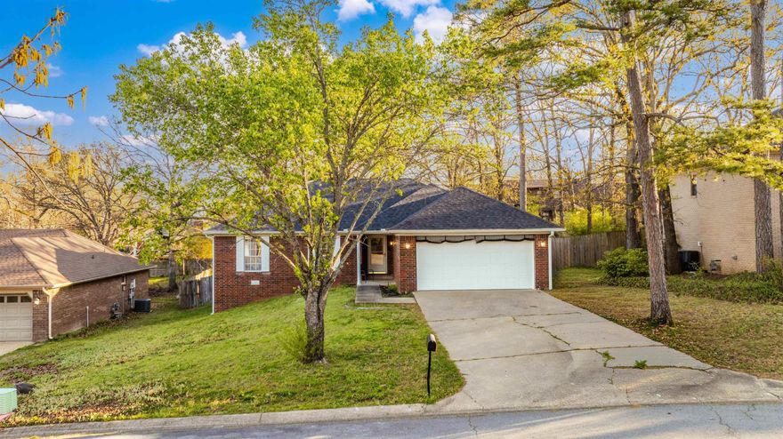 Welcome home to this beautifully remodeled gem in a great Maumelle neighborhood! Light, bright, and full of fresh updates, this move-in ready home features an inviting living space with updated flooring and a cozy fireplace. The spacious primary suite is a true retreat, complete with a large walk-in closet and a beautifully updated bath featuring double vanities, a soaking tub, and separate shower.  The kitchen shines with crisp white cabinetry, modern finishes, and plenty of room to gather. Step outside to a fully fenced backyard with mature trees, perfect for relaxing or entertaining.  Clean, updated, and easy to love… this one is a must-see! ?