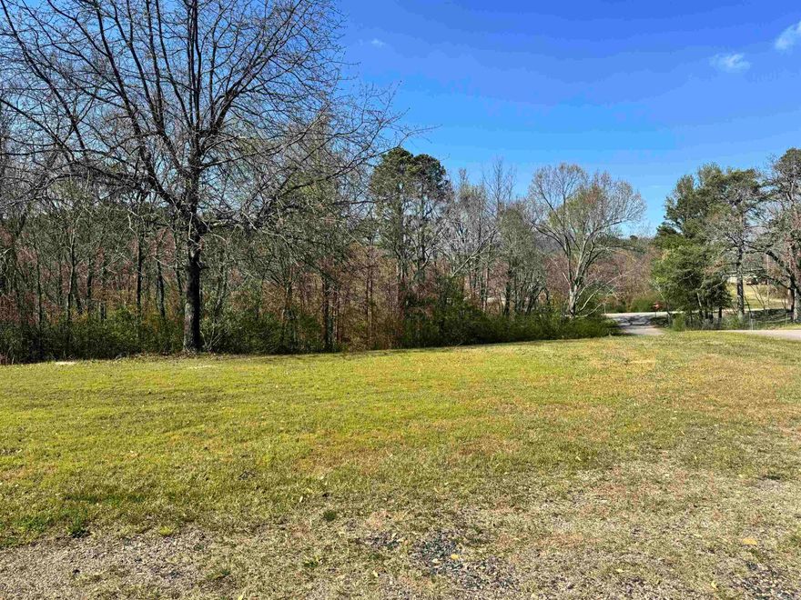 Discover the perfect blend of convenience and opportunity with this beautiful 6-acre tract located inside city limits! Featuring highway frontage off HWY 8 W, this property offers easy access while still providing plenty of space to spread out.  Utilities are already in place, including electricity, well, and septic—making it ready for your dream home, investment property, or future development. The land is partially cleared and partially wooded, giving you the best of both worlds: open space for building and mature trees for privacy and shade.  A gravel driveway winds through the wooded portion, allowing you to easily explore the back side of the property and envision all the possibilities.  As an added bonus, this property is just 2.3 miles from the new bike trails currently under construction—bringing recreation, value, and future growth right to your doorstep.  Whether you’re looking to build, invest, or simply enjoy a peaceful piece of land with room to roam, this property checks all the boxes!