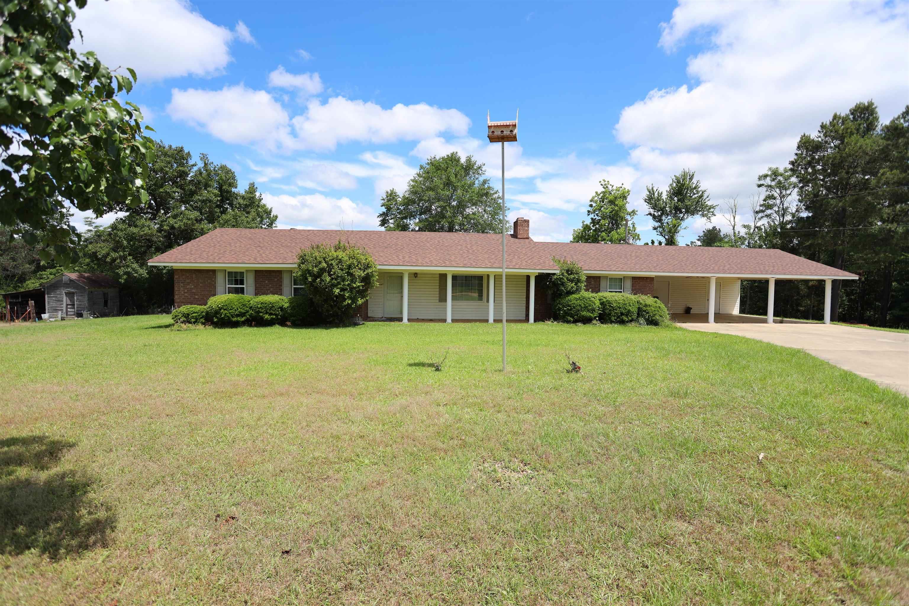 Spacious Home on 10 Acres with Bonus Mobile Home. Discover peaceful country living at its best with this well-maintained 3-bed 2-bath home offering 2,107 square feet of living space, set on 10 beautiful acres in mostly pasture with a serene pond. Built in 1977, this home has been cared for and includes a generator for added peace of mind. The property also includes a1998 mobile home, Ideal for extended family, rental income, or guest accommodations. Whether you're looking for a mini-farm, a quiet retreat, or just room to roam, this property has it all.
