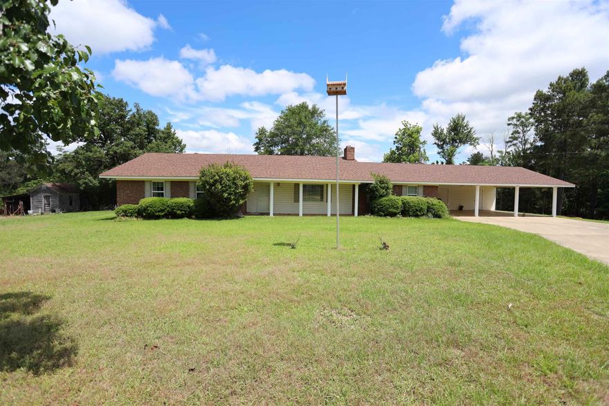 Spacious Home on 10 Acres with Bonus Mobile Home.  Discover peaceful country living at its best with this well-maintained 3-bed 2-bath home offering 2,107 square feet of living space, set on 10 beautiful acres in mostly pasture with a serene pond. Built in 1977, this home has been cared for and includes a generator for added peace of mind. The property also includes a1998 mobile home, Ideal for extended family, rental income, or guest accommodations. Whether you're looking for a mini-farm, a quiet retreat, or just room to roam, this property has it all.