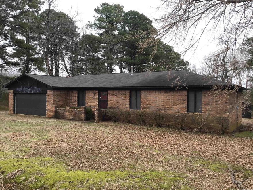 Great location in Bryant off Hwy 5. Property is zoned C2 with 1,568 sqft home, 3/4 of an acre and outbuildings. Investors looking for office space or someone that wants to be close to Arkansas Heart Hospital for housing. Easy access to Interstate 30, shopping and restaurants.