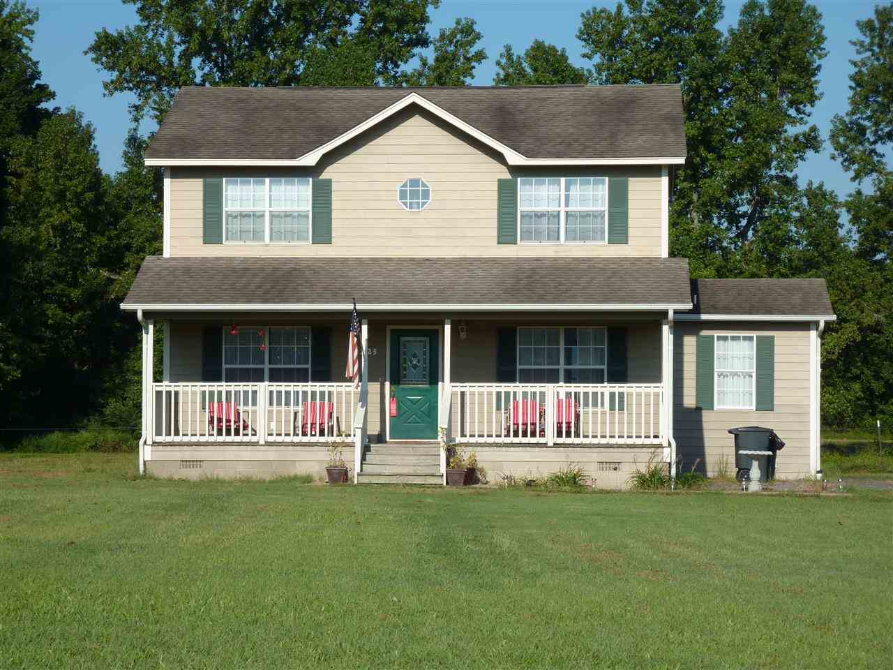 Country living with one acre, but close to everything! Enjoy this 4 bedroom, 2.5 bath home with separate dining room & large open living areas. Very peaceful & quiet with a nice front porch for sitting & relaxing. Sq. Ft. approx. measuring encouraged.