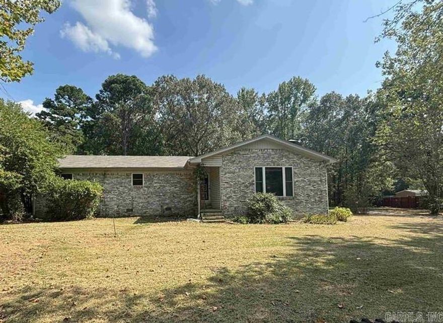 Charming Brick Home on 2 Acres – Move-In Ready! Three-bedroom, 2-bathroom. A new roof (4 years old) and newer Royal insulated windows, ensuring energy efficiency and peace of mind. Fresh interior paint throughout, along with new luxury vinyl planking flooring. A brand-new HVAC system. New plumbing fixtures and new light fixtures.  New appliances. The sunken den with a cozy fireplace and vaulted ceiling. Spacious laundry room and a huge kitchen/breakfast bar.  The enclosed sun porch adds an additional 238 square feet. 40x28 shop with a new garage door for all your storage and workspace needs.