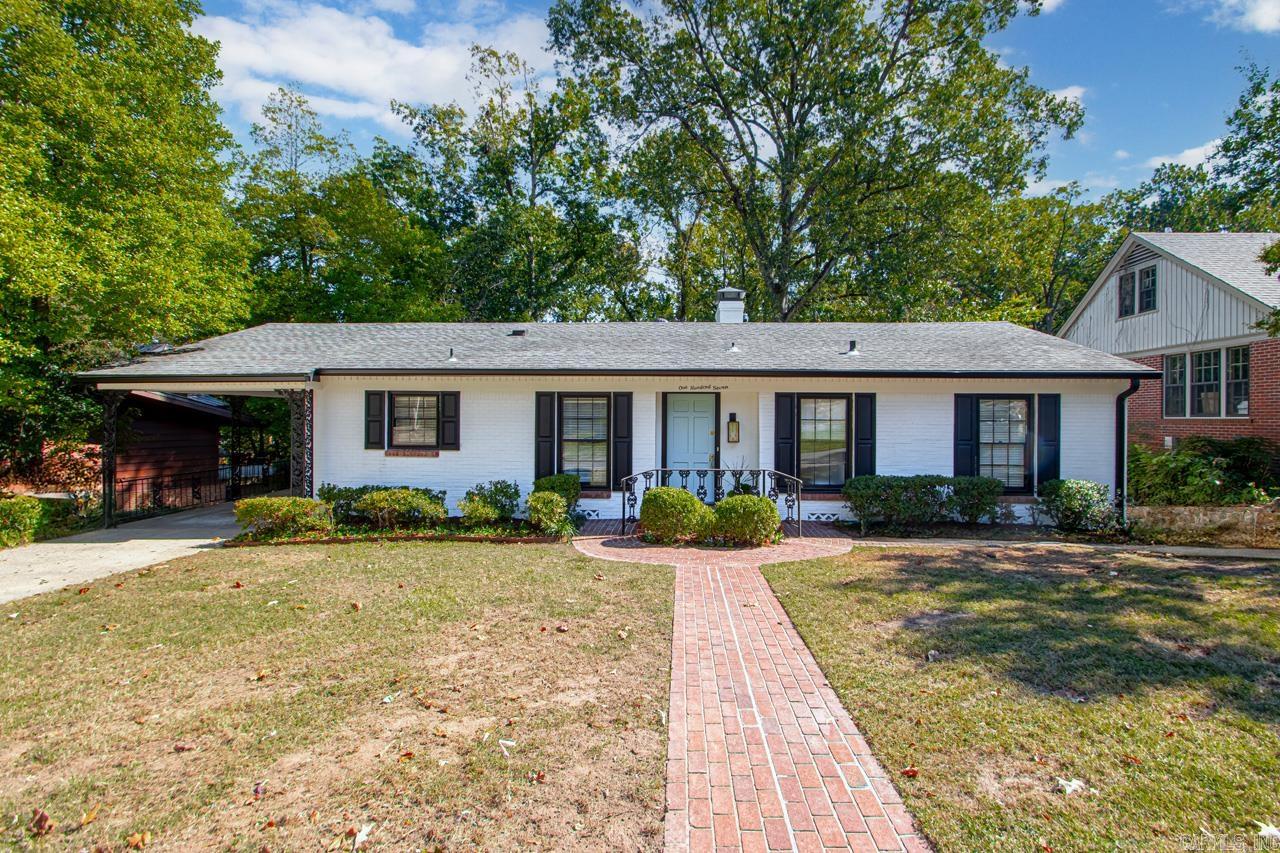 Welcome to this charming 3-bed, 2-bath home in the desirable Normandy subdivision. This home lives like a one-level and features two spacious living areas, perfect for relaxing or entertaining. Two fireplaces add warmth and a cozy atmosphere throughout. Downstairs, a private guest suite offers its own bedroom, en suite bath, living area, fireplace, and exterior entranceāideal for in-law quarters, or guests. Recent renovations include an expanded laundry room and a dedicated office space, enhancing daily function. With numerous updates, this home blends modern comfort with timeless charm. A storage building with electricity provides space for hobbies or extra storage. Enjoy a serene backyard that backs to green space for peaceful outdoor living. Donāt miss the chance to make this lovely home yours!