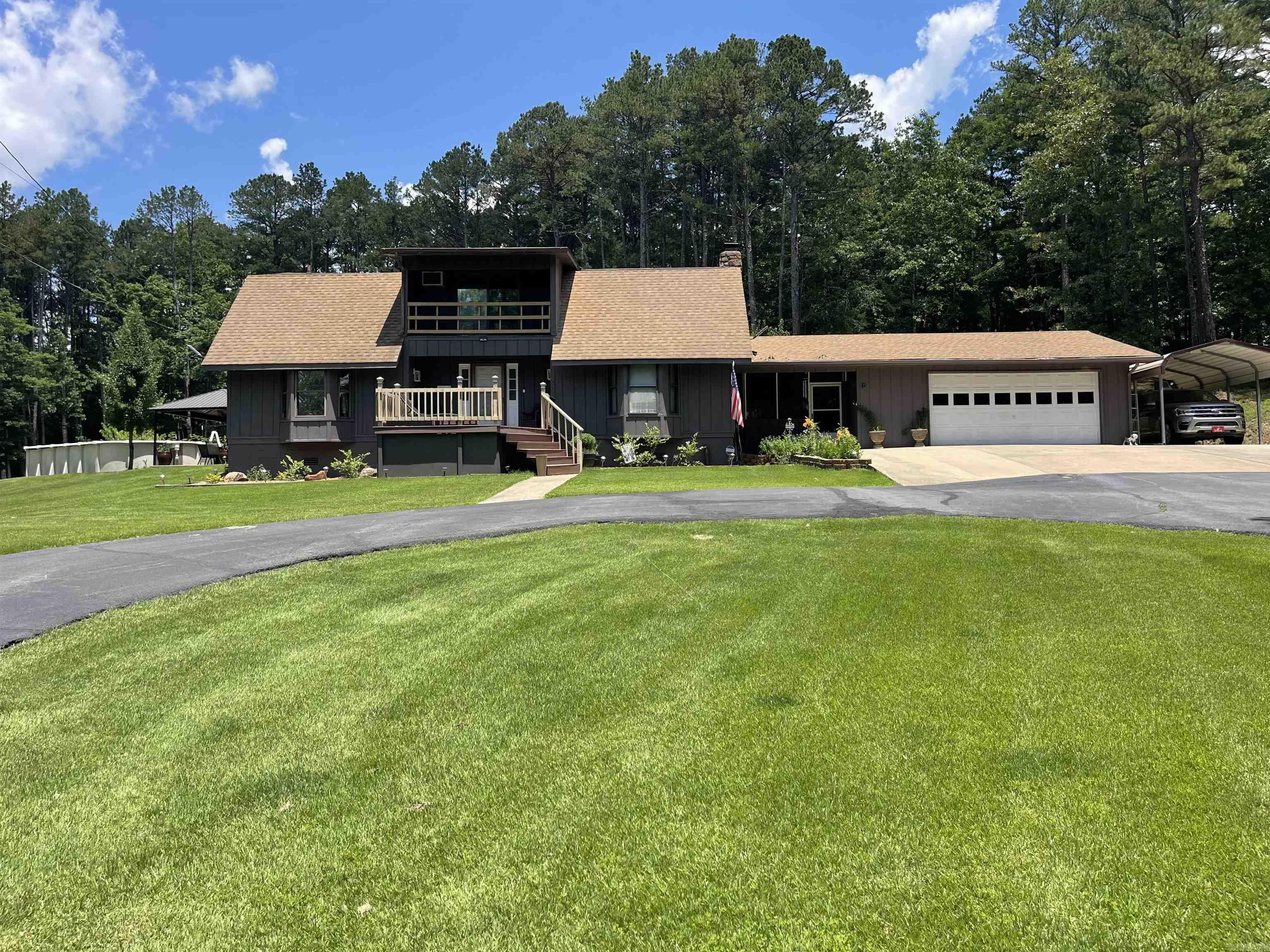 Completely updated 3 bed, 2 bath home on 3.07 acres in Clinton! Featuring 2,160 sq ft, this home offers a large granite chefās kitchen with stainless steel appliances, an island, and hardwood floors. Remodeled bathrooms, dual-pane windows, and fresh interior/exterior paint make it move-in ready. Enjoy high vaulted, open beam ceilings and a pellet stove for cozy living. Property includes a screened breezeway, composite decking, top quality above-ground pool (15āx30ā), two sheds, Connex box, and a circle drive. Outdoor lovers will appreciate the orchard with peach, apple, and pear trees, blackberry bushes, and 7 blueberry bushes!! Crawlspace is sealed/encapsulated and includes a sump pump and humidifier. LG refrigerator, large mirror above stove, and window coverings stay. Located in the Clinton School District with city water and an oversized 2-car garage. Additional furniture is negotiable. Donāt miss this updated retreat with privacy, space, and charm!