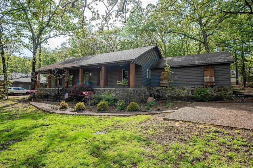 Eden Isle 3-bedroom/3-full-bath home in excellent condition!  Located one street over from Eden Isle Marina, this FURNISHED (with very few personal property exceptions) home includes an open-concept living/dining/kitchen with tall cathedral ceilings and large corner stone fireplace!  EVERYTHING was updated by a wonderful designer/decorator in about 2017/2018!  Wonderful kitchen with stainless appliances, beverage fridge and built-in microwave, large covered front porch, 2-car garage, large backyard and deck, and much more!  See the pictures...this home is spectacular!!!