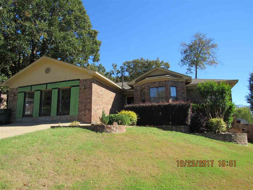 Nice home in a cul-de-sac, 3 bedrooms, split bedroom plan, tile floors in the wet areas, vaulted ceiling in the living room, garage has been converted and is in process of being completed and not included in the square footage, fenced yard, deck.