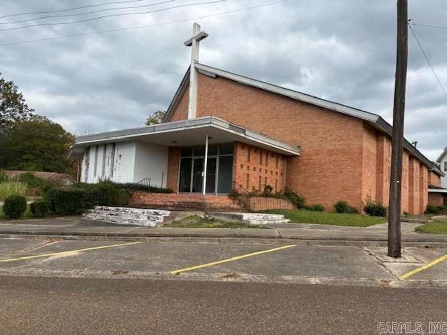 Listing is for 1217 Ross Ave., and 419 E. Spring St., House (parsonage is 1147 sq ft and is included with the sale.)