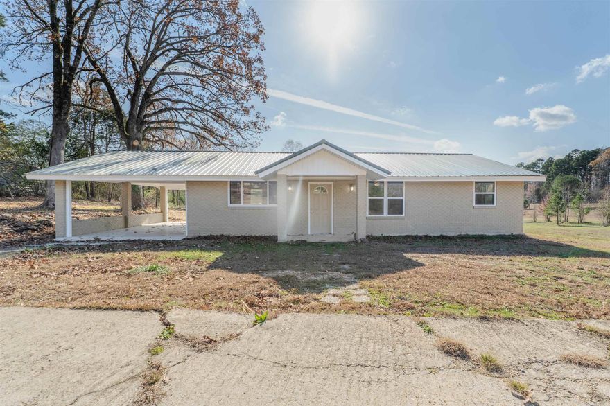 Motivated seller! Come check out this home and make and offer! This charming move in ready 2 bed, 2 bath home sits on 1.5 acres with a pond and stunning views! Nestled in a quiet wooded neighborhood, this home offers luxury vinyl flooring throughout an open floor plan, brand-new appliances, a new water heater, and a brand-new HVAC system. The primary bedroom offers an ensuite with a spacious walk-in shower! The modern updates blend seamlessly with the home's charm and functionality. This beautiful home could be your little slice of heaven!  Call to schedule your showing today.