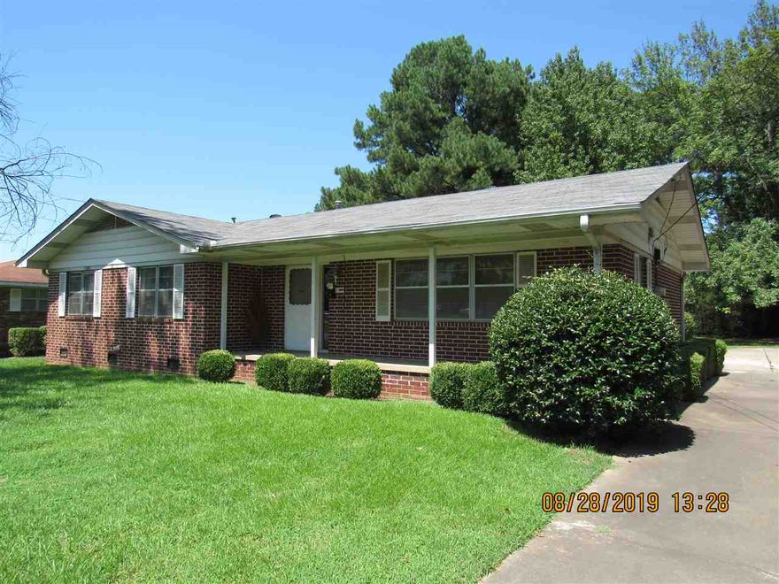 Well maintained older home across from UCA. 3 spacious bedrooms, wood & laminate floors throughout, all kitchen appliances including refrigerator, washer & dryer hook-ups, 2 car side entry carport with storage room. No Pets!!