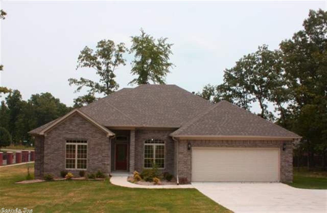 DRAMATIC 2010 4-BEDROOM, 2.5 BATH BRICK HOME loaded with nice upgrades. State-of-the-art kitchen w/granite countertops, stainless appliances, abundant cabinets & computer work center. Great master suite w/tray ceiling, jetted tub, separate shower & BIG walk-in closet. Formal and informal dining. Designer touches throughout--truly one of a kind. Covered deck. TREES! Almost 2200 sq. ft. of luxury...High ceilings, arches, crown molding & MORE!....See to appreciate!!