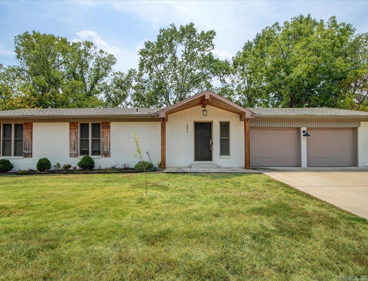 4-Bedroom Home with New Roof & Spacious Yard This 4-bedroom, 2.5-bath home is located in a quiet neighborhood with easy highway access. The new roof was just installed, and the home was updated in 2019, including a kitchen remodel with newer cabinets, countertops, and a large island. The main level offers an open layout with space for gathering, while the downstairs den features a brick wood-burning fireplace. The primary bedroom includes a tiled shower, freestanding tub, double vanities, and a walk-in closet. Outside, the fenced yard provides plenty of space for gardening, play, or relaxing. The deck is great for outdoor cooking, and the 2-car garage offers additional storage. Agents - Call Showing service to schedule all showings.