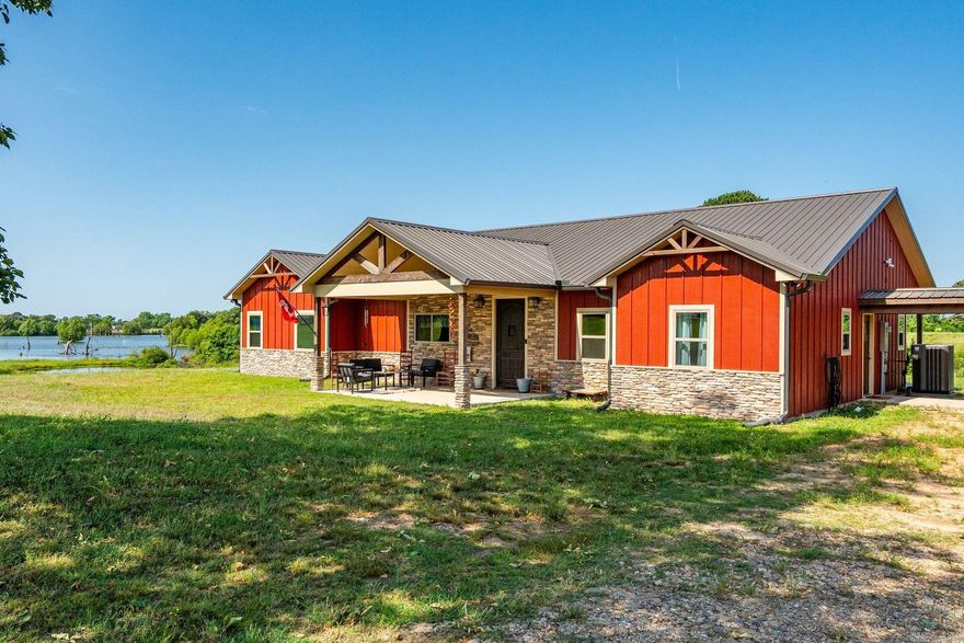 Welcome to modern country living on 11.74 acres in Nashville, Arkansas. Built in 2023, this custom 3 bed/2 bath home with a dedicated office that can be converted into a 4th bedroom combines quality craftsmanship, thoughtful design, and peaceful outdoor living. Inside, you’ll find vaulted ceilings, a cozy wood-burning stove, and custom finishes throughout, including hand-stained cabinets, doors, and trim. The kitchen was designed to impress with granite countertops, a massive 8 ft island, farmhouse sink, 36 inch gas range, walk-in pantry, and custom backsplash. The spacious primary suite features a beautiful board and batten accent wall and back porch access. The ensuite boasts raised vanities, dual walk-in closets, soaker tub, and a large shower with a rain head and access on two sides. Enjoy sunsets from the full-length western-facing back porch overlooking the stocked pond and surrounding acreage. Property also includes community lake access, a 30x40 shop with attached lean-to, an additional 20x30 detached shop, and a separate pad-ready lot with electricity and water already in place. A rare move-in ready acreage property with space, privacy, and modern amenities.