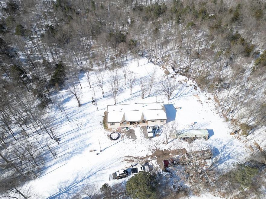 Turnkey +/-80 acres in Concord (Cleburne Co.) with a 2018 modular home offering 2,347 SF, 4BR/2BA, electric heat, central A/C, fireplace, and kitchen appliances (range/oven, refrigerator, microwave, dishwasher, disposal). Concord School District. 40' shipping container shop wired for 120V & 240V. Rural water via Tumbling Shoals Water Authority; electric by First Electric Cooperative; high speed internet by Connect 2 First; garbage service by Waste Connection. Septic in place with 1,000 gal poly tank and field lines. Land features mixed timber (hardwoods, pine, cedar), diverse topography, a cave, and a spring feeding a seasonal creek. Powerline ROW bisects property and can be used for a food plot/shooting lane. Raised box blind in place; known for consistent quality deer. Approx. 21 mi SW of Batesville, 20 mi SW of the White River, 11 mi to Batesville Motor Speedway (Locust Grove), and 20 mi NE of Heber Springs/Greers Ferry Lake.