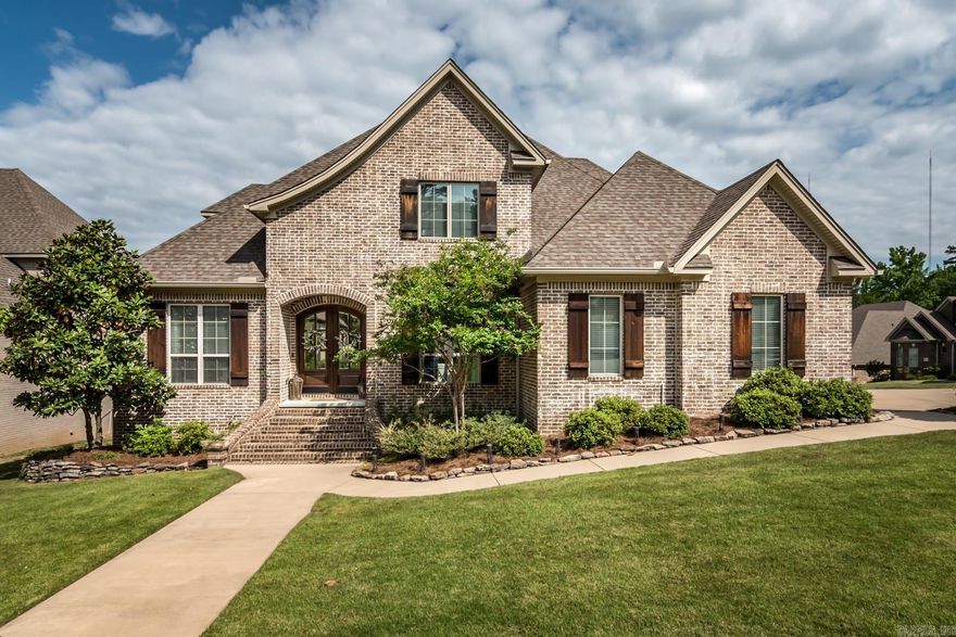 Exceptional Chenal Valley home with timeless design positioned on a corner lot adjacent to golf cart paths to the golf course. Welcome home through double arched wooden doors greeted by an open-concept floor plan, with a formal dining room ideal for hosting gatherings.The heart of the home resides in the great room and gourmet kitchen, exuding a cozy atmosphere.The great room features a fireplace with oversized windows frame the picturesque views of the screened-in porch. The kitchen features Quartzite countertops and Thermador appliances, including a gas range, a KitchenAid ice machine, a Sharp microwave drawer and spacious walk-in pantry. Tucked away for privacy, the primary bedroom suites offers a spa-like bathroom with architectural elegance, featuring a soak tub, shower and his & her bathroom vanities. The primary closet boasts spacious storage & a second laundry service.Two additional guest bedrooms, with en-suite bathrooms, are on the main level.Throughout the main living areas and bedrooms, oak hardwood floors imbue the space with character.Upstairs features a spacious game room, two bedrooms and a hall bathroom.  **Previous buyers changed their mind without inspecting!