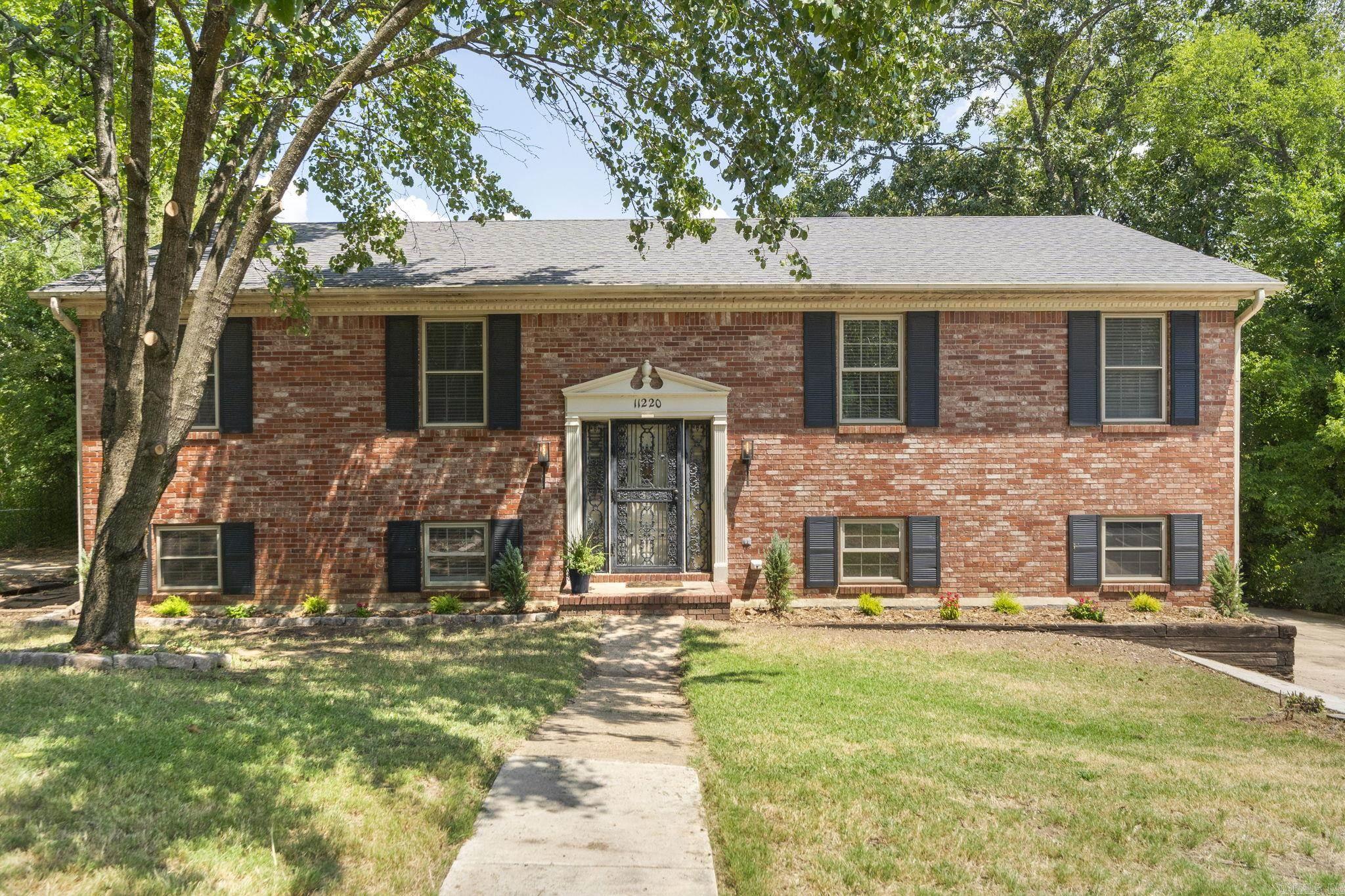 This beautifully updated home offers space, style, and convenience all in one! Featuring new custom kitchen cabinets, quartz countertops, and tile flooring, the heart of the home is as functional as it is stunning. All three bathrooms have been recently remodeled, and the home boasts three generous living areas, giving plenty of room for entertaining or relaxing. The large upper den provides flexibility and could easily serve as a fifth bedroom or home office. With two oversized primary bedrooms, there’s room for multi-generational living or luxurious guest space. Enjoy outdoor living with a private pool, complete with a new high-efficiency pool pump (2024). Additional upgrades include a brand new HVAC system (2024) for year-round comfort. A side-entry two-car garage and oversized driveway offer ample parking and storage. Located just off Cantrell Road, you're minutes from shopping, dining, and everything Little Rock has to offer. Don’t miss your chance to own this move-in-ready gem in an unbeatable location!