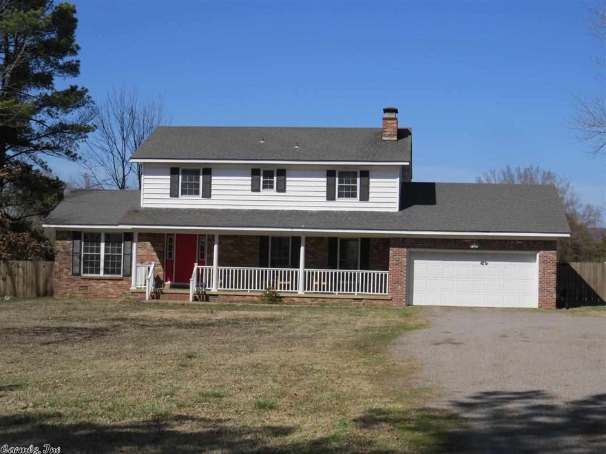 5.45 acres in Pottsville! Oh what a feeling when you find something good! Full of heavenly country charm and swag. It's what you have been waiting for...in POTTSVILLE. This 4 bedroom farmhouse features 1800 sqft with 2 separate living areas and real hardwood flooring, a display of genuine character. Settle down in the evening time by the wood burning rock fireplace. On 5.45 acres of mostly pasture, there is lots of space to host large gatherings or have a huge bon fire!