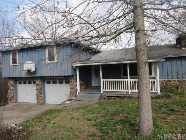 Beautiful country setting with acreage. Large full fenced yard. House is split level with 4 bedrooms/1 Bath upstairs; Living Rm, Kitchen and Dining on main level and Bonus Rm and 1/2 BA with Laundry on Lower level. Spacious 2 car garage. Back Deck overlooks a large backyard. If space is what you want, this is it. Priced to sell. See agent remarks.