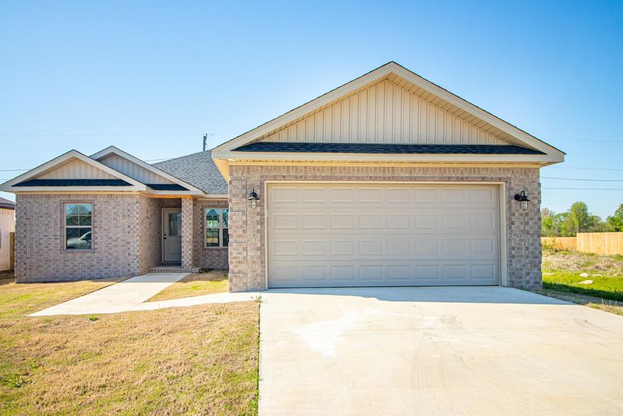 How about a brand new spacious three bedroom, two bath home with a $0 down option? Look no further than this beautiful new construction in the Redwood Subdivision of Bono. The inside boasts large rooms, custom cabinets with a walk in pantry in kitchen, granite counters, stainless refrigerator, tile flooring, tile shower/tub combos, stainless appliances and gorgeous wood trim throughout.  Living room and master bedroom have outlets for wall mounted tvs. You will also enjoy the covered patio and short drive into Jonesboro.