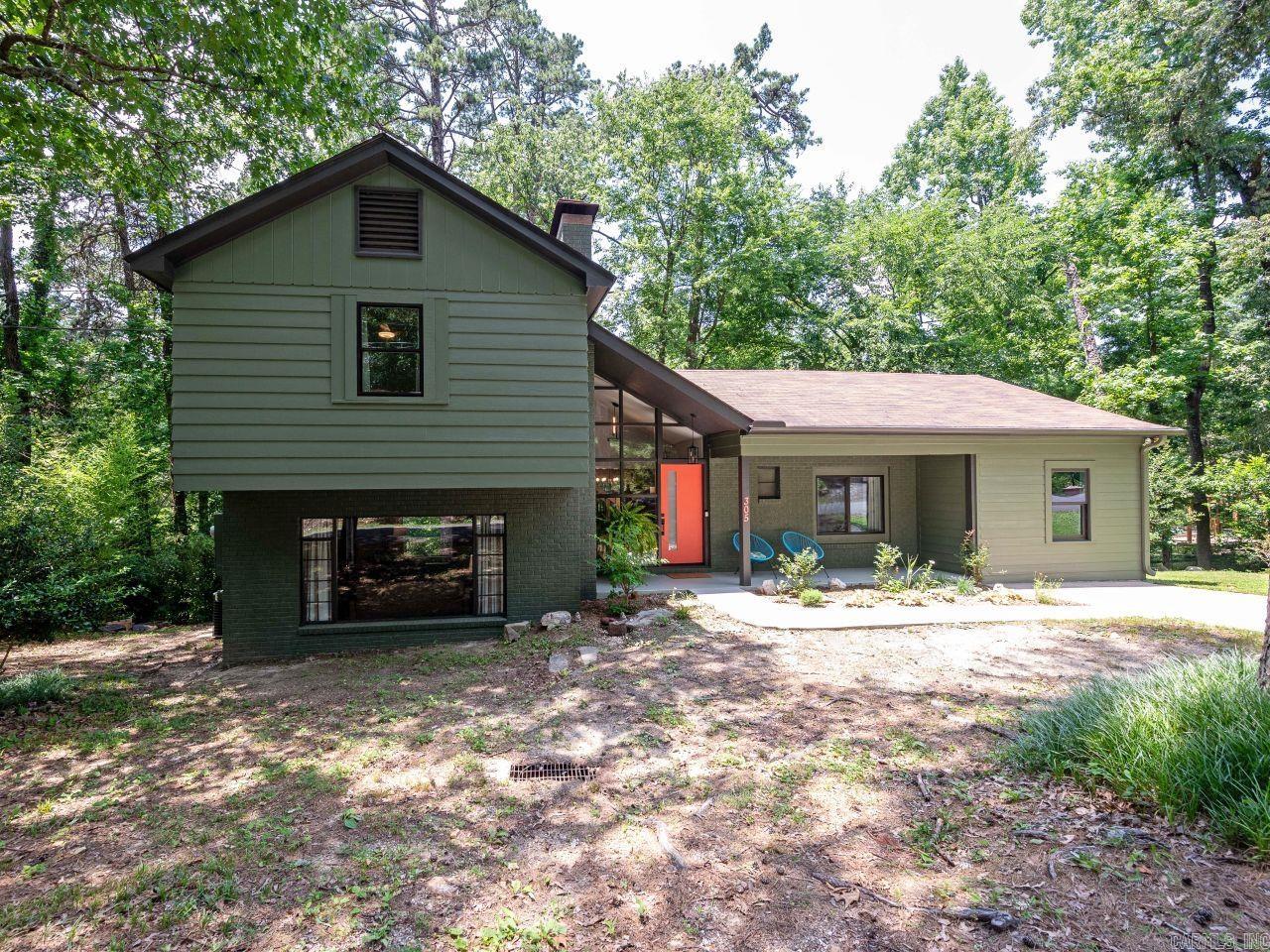 Nature abounds with this remodeled Mid-Century Modern 3BR/2BA home spanning 2,061 sf. The home sits on almost half an acre of mature pines & oaks, across the street from thousands of acres of undeveloped National Park land. Professionally painted inside & out with high-quality Sherwin-Williams, less than 1 yr. This home boasts new fixtures, fans & plenty of natural light. Remodeled kitchen features stainless-steel appliances less than 2 y.o., induction range w/air-fry oven, LG French door frig, dishwasher, microwave & leathered granite countertops. A spectacular outdoor dining deck off the kitchen, an eat-in kitchen plus separate dining room for families & entertaining. This tri-level home offers a spacious den w/wood burning fireplace, perfect for cozy evenings. Upstairs 2BR/1BA w/outside deck includes a premium hot-tub (4 yr wnty left) and in-closet attic access for added convenience. Lowest level displays laundry room with washer/dryer + walk-out bonus room. Live in a quiet, historic neighborhood a short 15 minute walk from restaurants, shopping and Bathhouse Row. Donāt miss this opportunity to live on North Mtn where nature is your neighbor. Schedule your private showing today!