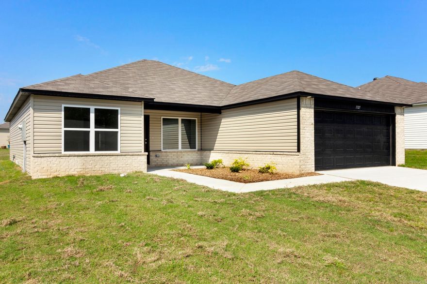 The Lowell II plan has a stately front walk that welcomes you into a bright, airy Living Room and spacious Kitchen. The Kitchen has a breakfast nook large enough for most Kitchen tables, and also has a Kitchen Island! The Master Suite is generously sized. Come tour this lovely home today!  Valuable upgrades included: plumbing faucet upgrade 2, 8" deep Kitchen sink, door bell, Kitchen Island with laminate top, Luxury Vinyl Plank flooring in wet areas and Living Room and adjacent hallways, raised ceilings in Living Areas per municipal requirements, fiberglass exterior doors, Cheyenne style doors, baseboards level 2, full sod, microwave hood in Kitchen.      ***AGENTS: PLEASE SEE AGENT REMARKS OR SHOWING REMARKS FOR VERY IMPORTANT INFORMATION.***  THIS HOME IS COMPLETE.  NOTE: Annual assessments depend on the lot, and assessment amounts range from $398-447. The bond expires 2038.