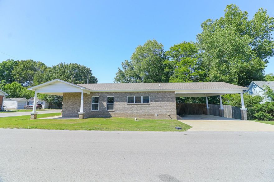 Delightful open floor plan featuring 2 bedrooms with large closets, 2 bathrooms, all brick home on a corner lot. This charming home is located in a well established neighborhood. The kitchen features generous cabinets, granite countertops, abundant lighting, luxury vinyl flooring. Some photos have been virtually staged. This home is a must see!