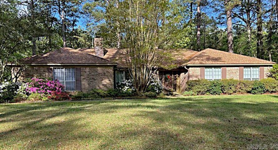 This charming home sits on a large shady corner lot. It has four bedrooms and 2 full bathrooms. It was bulit in 1977 and has had many updates! As a one owner home it is truly beautiful inside and out. It also has a large shop that has power and an AC. This home is move in ready.