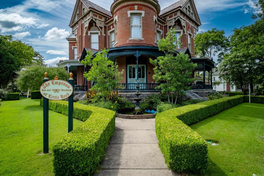 The Hornibrook Mansion, built in 1888, stands as a historic landmark celebrated for its extraordinary Queen Anne architecture—one of the finest examples of the style in the nation. Listed on the National Register of Historic Places, it is now best known as The Empress of Little Rock, a beloved tourism icon and thriving Bed & Breakfast that welcomes guests from around the globe. For over two decades, The Empress has been a symbol of hospitality, earning the prestigious AAA 4 Diamond rating and is the only Michelin hotel in the state. With exclusive licensing and permits for use as an event space or intimate wedding venue, the property offers untapped potential for significant revenue growth. The mansion’s unique architectural features—including a divided stairway, a 3 ½-story corner tower, a stained-glass skylight, and octagonal-shaped rooms—showcase the grandeur of late-19th-century design. This expansive property is being offered fully furnished and turnkey, ready to continue operating as a business, or it can be purchased as a furnished private residence. This is a rare opportunity to own one of the most iconic and historically significant homes in the South.