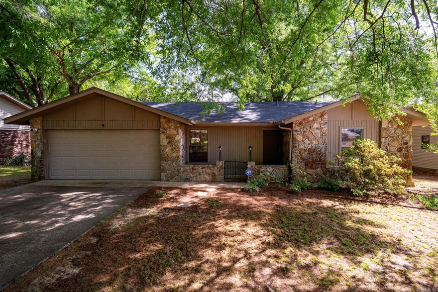 Charming and Move-In Ready!! This cozy 3 bedroom and 2 bath home is the perfect opportunity for first-time home buyers or investors looking to add a great rental to their portfolio. You will feel right at home in the comfy living room with its vaulted ceiling, gas fireplace, and modern touches. This beautiful updated kitchen features new cabinets, countertops, and tile flooring. The large covered patio provides a great space for spending time outdoors year round. The roof and hot water heater were replaced in 2021. This great property is ready for its new owners and is a must see! Schedule your showing today! *Agents See Remarks*