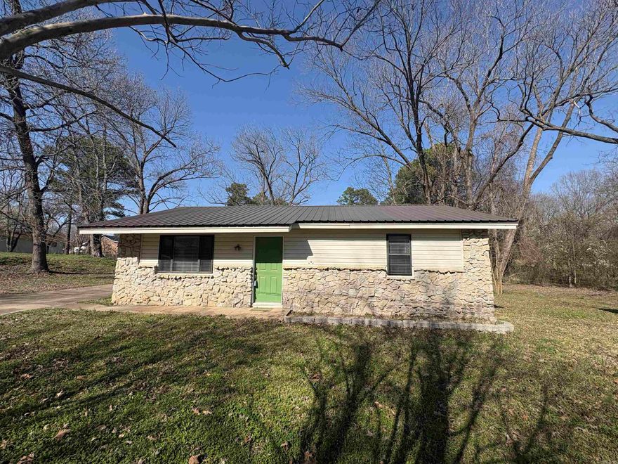 Charming 2-bedroom, 1-bathroom home situated on over an acre in the quaint town of Bradford. This move-in-ready property offers peace of mind with an HVAC system and metal roof, both replaced in 2019. Perfect for first-time buyers, downsizers, or investors, the spacious lot provides plenty of room to enjoy the outdoors or expand. Don't miss this opportunity to own a well-maintained home with small-town charm and modern upstairs! Freshly remodeled bathroom with tiled shower.  New Refrigerator Stays. Large 18x36 Shed in Backyard Conveys!!! New Paint Throughout, New dishwasher. Stove is like new. New ceiling fans.   6 Lots!!!! Schedule your showing now!