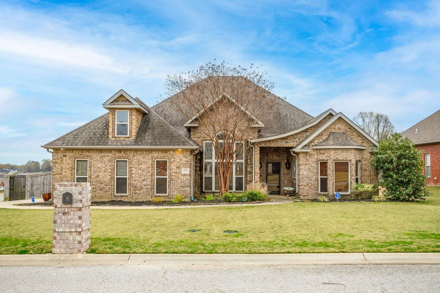 Stunning Valley View home featuring an in-ground pool, gorgeous design elements, and curb appeal for days.  The all brick and stone Flatrock Trail home uses brick design patterns, landscaping, and corner lot placement to catch the eye.  An iron gate invites you to the saltwater in-ground swimming pool.  Beyond the concrete patio, wooden landing, and grilling deck is a large screened in porch.  It provides enough space for living, dining, and large gatherings.  The homes interior boasts large tray ceilings, expansive windows, and beautiful details.  From the wine rack in the dining to the bay window in the front bedroom it is not hard to find character personalized to this home.  The bedrooms are all large and the windows let in plenty of natural light.  The primary bathroom features a large vaulted ceiling above the jet tub that is sure to impress.  Large closets, new appliances, a rainbird sprinkler system, side load garage, and a security system are just a few extra features to help you fall in love with this property.  Set up your personal tour today!