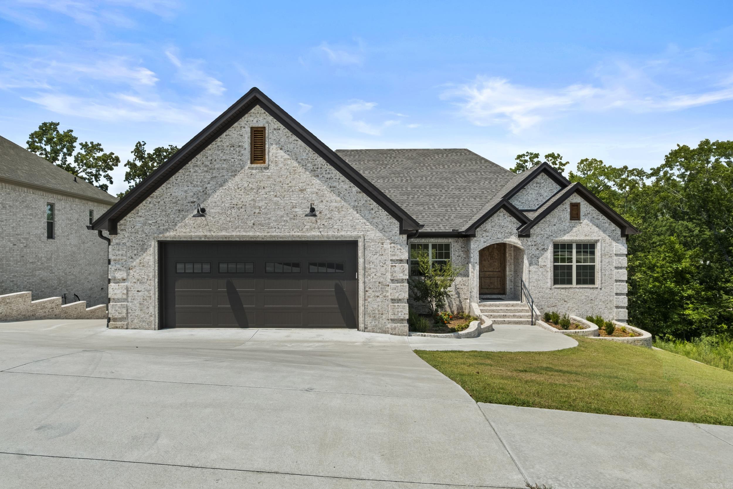 Nestled in the sought after Creekside subdivision, this home literally backs up to the serene green space and creek offering a private retreat feel. Spacious 3254sqft of living space. Open concept living room, dining room, and kitchen with high end finishes and tons of natural lighting. The primary suite is also on the main level with a generous walk in closet that opens to the laundry room. 2 bonus spaces throughout the home, one on the main level is ideal for an office or play room while the downstairs area is perfect for media room or 2nd living area. The tankless hot water heater and gas HVAC along with the radiant barrier roof and low E windows make the home incredibly energy efficient. Custom crafted by Chris Nelson and comes with a 1 year builders warranty to add peace of mind. This newly built gem is a perfect balance of elegant design, smart energy efficiency, and flexible living spaces.