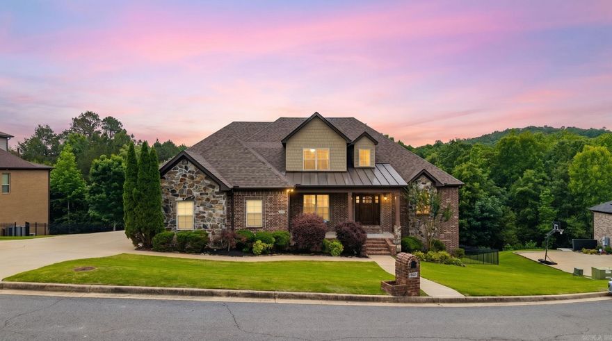 **4-bedroom, 3.5-bath home with 3,860 square feet in Woodlands Edge, one of West Little Rock's most sought-after neighborhoods — on a cul-de-sac lot with a private in-law suite, three-car garage, and gated backyard access to Brodie Creek. BRAND NEW ROOF 2026, Architectural rubberized asphalt with a Class 4 (highest) hail rating.**  This well-maintained two-story home in Woodlands Edge sits on a cul-de-sac lot in West Little Rock, Arkansas 72211 and offers 3,860 square feet of living space with a fully fenced backyard and a main-level in-law suite with its own private garage entrance — a rare setup for multi-generational living or long-term guests. The main living area features a fireplace in the living room, a separate formal dining room distinct from the kitchen, and a dedicated laundry chute. The primary suite includes a second fireplace and a walk-in closet with a built-in vanity and built-in ironing board.  Upstairs, a bonus game room provides flexible space for a home theater, playroom, or second living area. Tankless water heaters serve the entire home for energy-efficient hot water on demand.