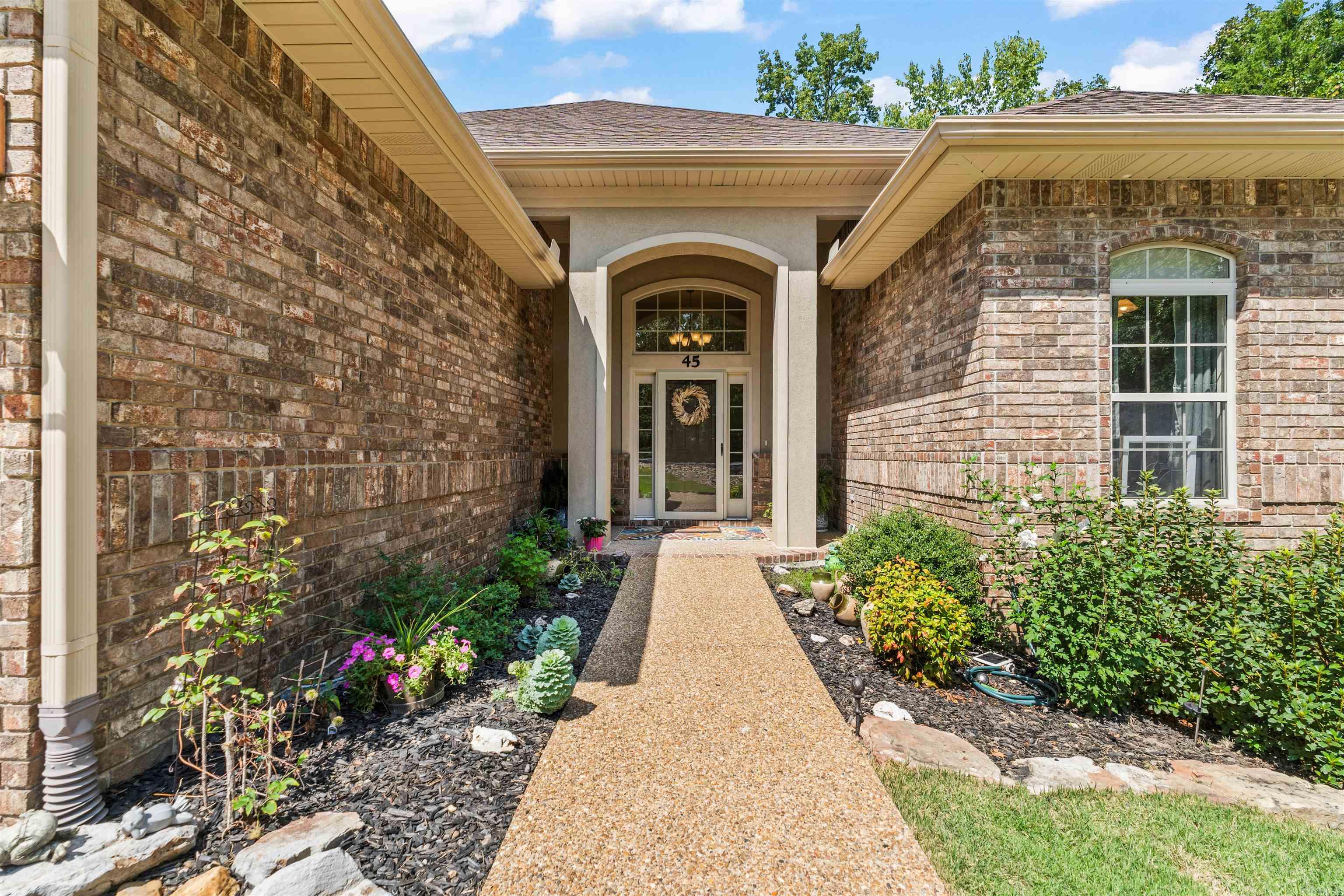 Beautiful one level home with great curb appeal on the east side of HSV. This well-maintained Cooper built home offers an inviting open floor plan and thoughtful design. Featuring 3 bedrooms in a split -bedroom arrangement, 2-1/2 bathrooms and two-car garage, it blends comfort with convenience. The kitchen boasts a center island, breakfast bar, walk-in pantry and separate pantry for abundant storage. The spacious primary suite includes a large bath with double sinks, tub and walk-in shower. Additional highlights include a gas fireplace for cozy evenings, two water heaters, covered patio for year-round enjoyment and a separate laundry room for added functionality. Upgraded window coverings and landscaping! New roof in January 2024, new heat pump in 2022 and newer carpet in living room and dining area. With great curb appeal, a single-level layout and a location in a beautiful neighborhood, this home is ready for you to move in and enjoy!