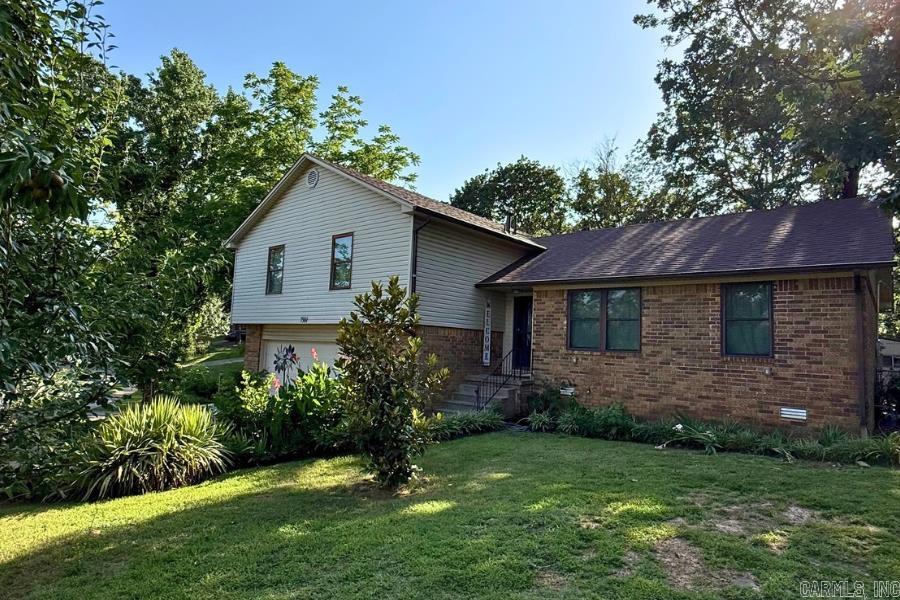 Photos Coming Soon! Welcome to this beautifully updated split-level home in the heart of Indian Hills! Featuring a new roof (2022), new gutters (2021), and a brand-new 12x30 deck with a covered gazebo that conveys, this home is move-in ready inside and out. The kitchen and both bathrooms have been FULLY REMODELED, and the layout offers both a cozy den and spacious living room. The garage is heated and cooled, offering flexible space for hobbies, workouts, or projects. Sitting on a huge lot for the area, you’ll love the gated extra parking pad, perfect for trailers, boats, or additional vehicles. Two sheds, including one with electricity, offer tons of storage. Ideal location—convenient to both NLR and Sherwood with quick freeway access!