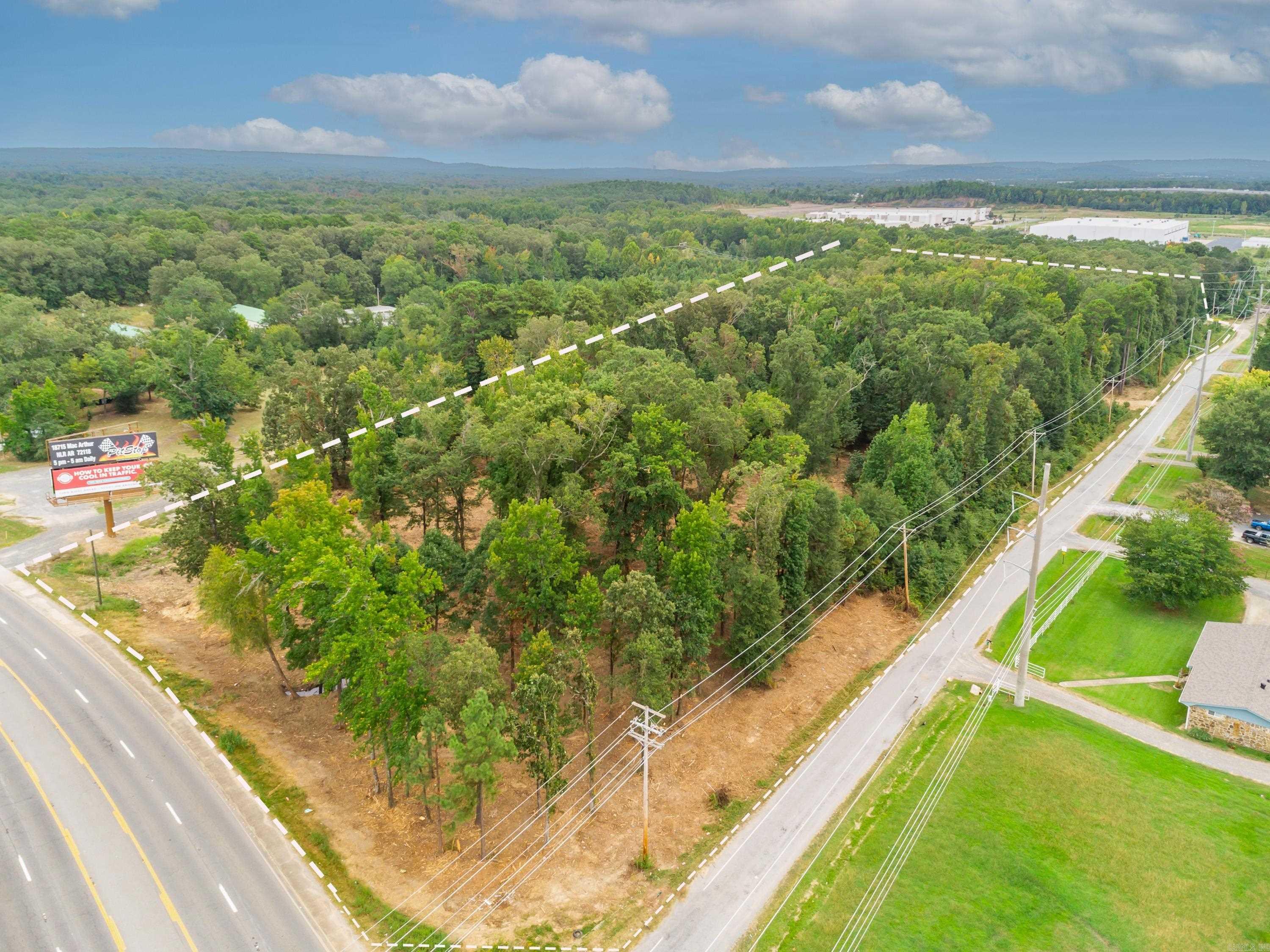 Considering Moving Your Business To A Higher Traffic Location? Look no further. Ready To Start A New Business? Here You Go! I-40 Exit 142 Maumelle/Morgan Area. Commercial Land To Be Sold Divided in Lots or Sold Whole. 8 Buildable Acres. 8 Lots Total. Prices Vary. Frontage, Middle and Back Lots Available. Utilities Available Are Entergy Electricity, Summit Gas, Central Arkansas Water, North Little Rock Wastewater and Internet. Located Outside City Limits of Maumelle. Pulaski County. One day this area will be annexed with the City of Maumelle. Land has been partially cleared and is easy to access for viewing. Comes with multiple ingress and egress. Using Hwy 365 and Tanning Rd. Existing Survey Available. Agents See MLS # 24038938 Listing Commercial Acreage.