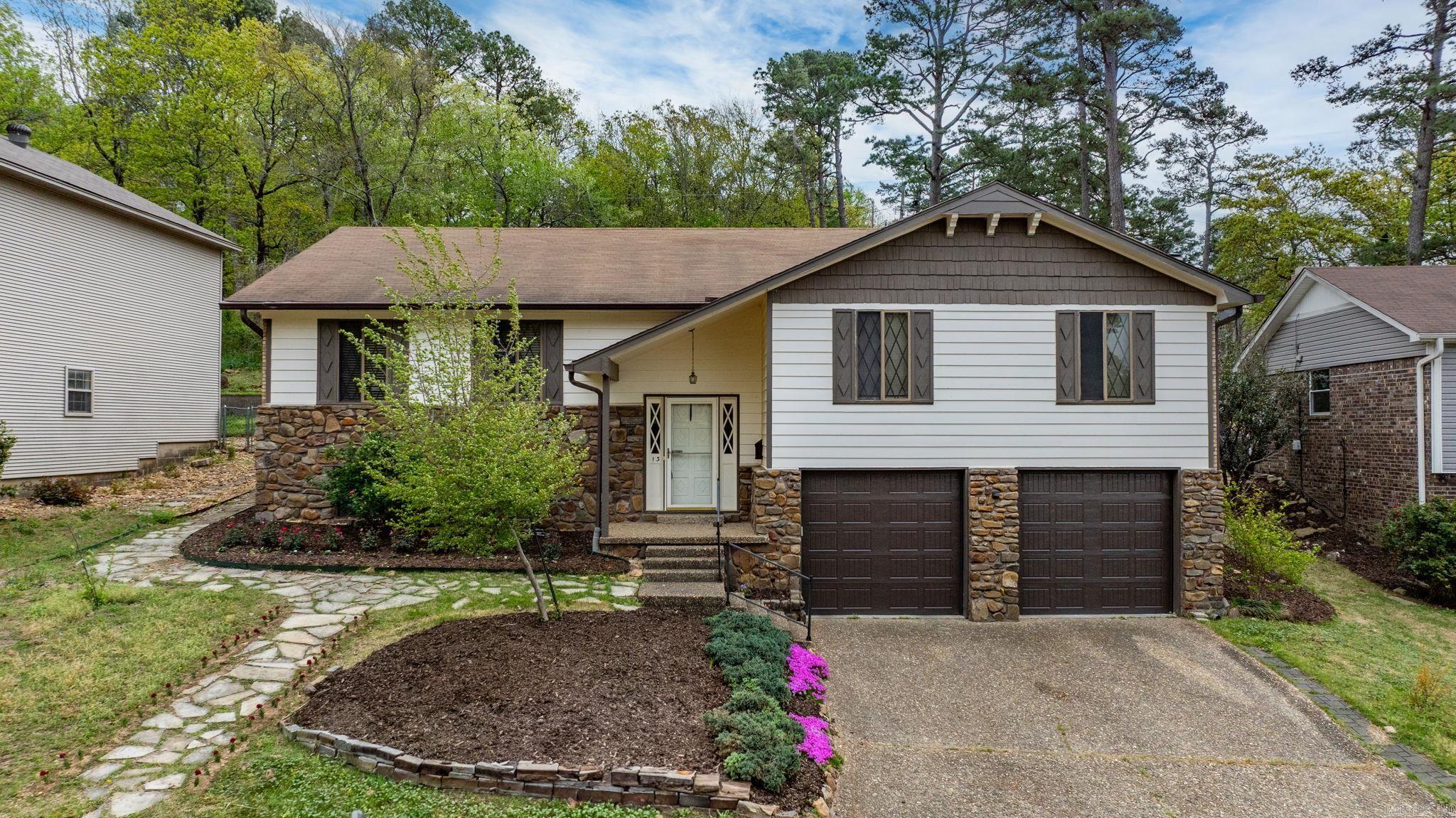 NEW ROOF- May 2025!!! Wonderfully updated split-level gem tucked away on a quiet cul-de-sac in the sought-after Echo Valley neighborhood of Little Rock. This 4-bedroom, 2-bathroom home offers a great layout with all bedrooms on the upper level. Downstairs, youāll find a spacious second living area ā perfect as a den, media room, playroom, or even an additional bedroom. The kitchen features ample cabinetry, an oversized eat-in island, and easy flow into the formal dining and main living areas. Set on a 0.45-acre lot, the fully fenced backyard offers a private retreat with fresh landscaping and plenty of space to enjoy. A new roof was just added May 2025! Echo Valley residents enjoy fantastic amenities like a swimming pool, two parks, tennis court, and shaded picnic areas ā ideal for relaxing weekends and community connection. With its move-in-ready updates, flexible layout, and prime location near schools, shopping, and dining, this home delivers comfort, convenience, and lifestyle in one perfect package.