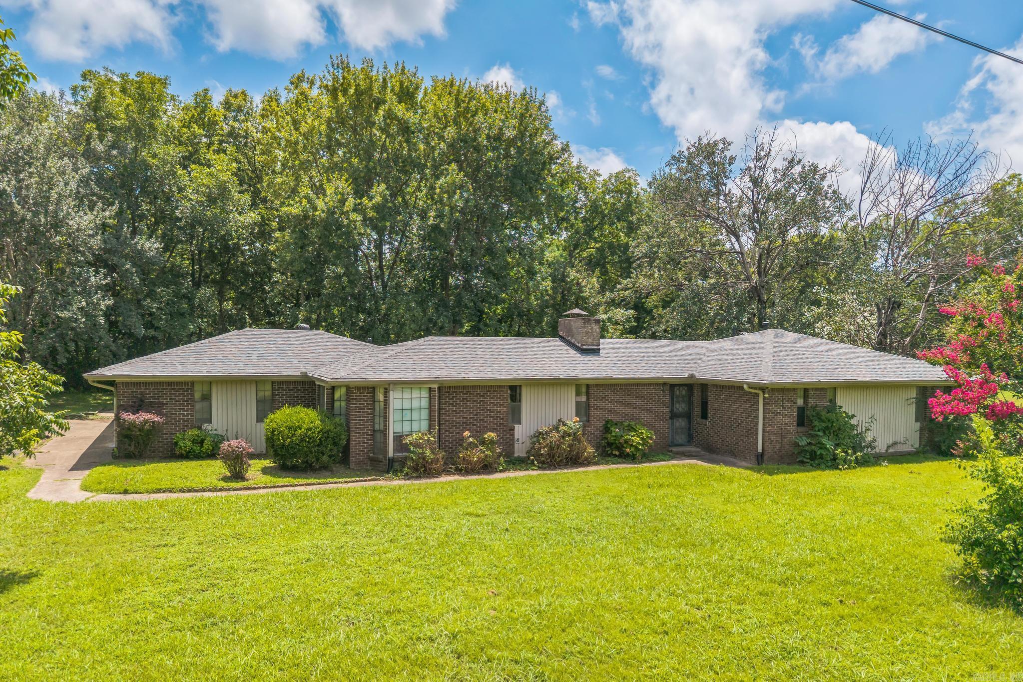 Discover the perfect blend of space, convenience, and opportunity with this unique property located just minutes from the heart of Little Rock. Sitting on a spacious lot with easy access to I-30 and I-530, this home offers both comfort and potential whether youāre looking for your next residence or an investment opportunity. Property Highlights: 3 Bedrooms / 2.5 Bathrooms ā A functional layout with plenty of room for family or guests. Large Lot ā Ample yard space for gardening, outdoor entertaining, or future improvements siting on just over 1 acre. Convenient Location ā Quick access to Little Rock amenities, shopping, schools, and dining, while still enjoying a quiet setting. Versatile Potential ā Ideal for homeowners wanting room to grow or investors seeking a property with great value and accessibility. With some personal touches and updates this is your perfect home. Donāt miss the chance to make this property your own!