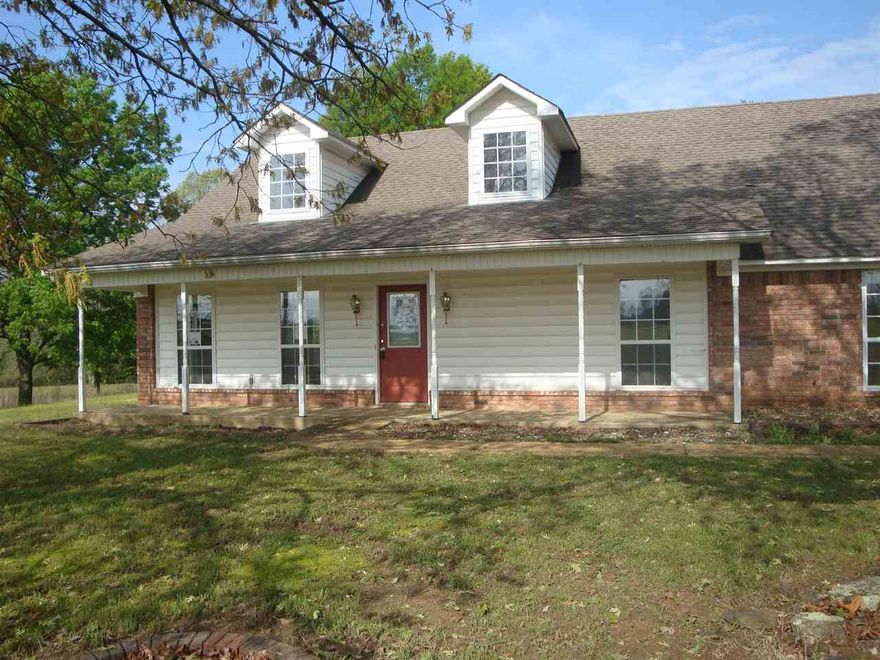 Spacious home in the country has all the right features, from a wide front porch to a second story with dormer windows that has been floored and is ready for expansion. Decorative concrete floors in kitchen and dining area. French doors to patio. Huge shop with two roll-up doors. Safe room.This is a HUD property Case # 031-343823. Offers are to be submitted online at HudHomeStore.com.