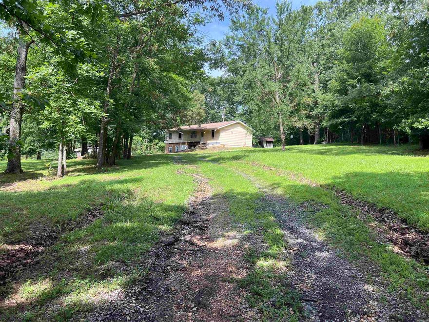Fixer Upper Home on 1.65 surveyed acres just minutes from the Buffalo National River. The property has paved highway 374 frontage, city water, electric, septic, and high speed fiber internet.