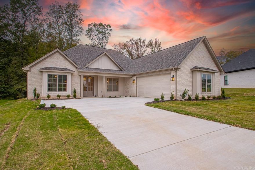 Welcome Home! Gorgeous! Absolutely Gorgeous! Backs up the woods! Enjoy the privacy! Nice big back porch! Where to start? Tall ceilings! Vault ceiling in the family room/kitchen! The lighting is tremendous! Tall base boards! No carpet throughout! Gas log fireplace! w/ built-ins on each side! Separate dining! Kitchen has a 6 burner gas stove! The oven will hold the largest turkey! Island for everyone to prep! Big pantry! Coffee Bar! Primary bedroom will hold all of the furniture & the spa bath... oh my my my! Luxurious! Deep soaking tub & walk through shower w/rain head etc, etc!! Closet is bountiful and it opens to laundry w/sink! 4 bedrooms or 3 w/ office! You will just love this! Light just floods the space! Welcome Home!