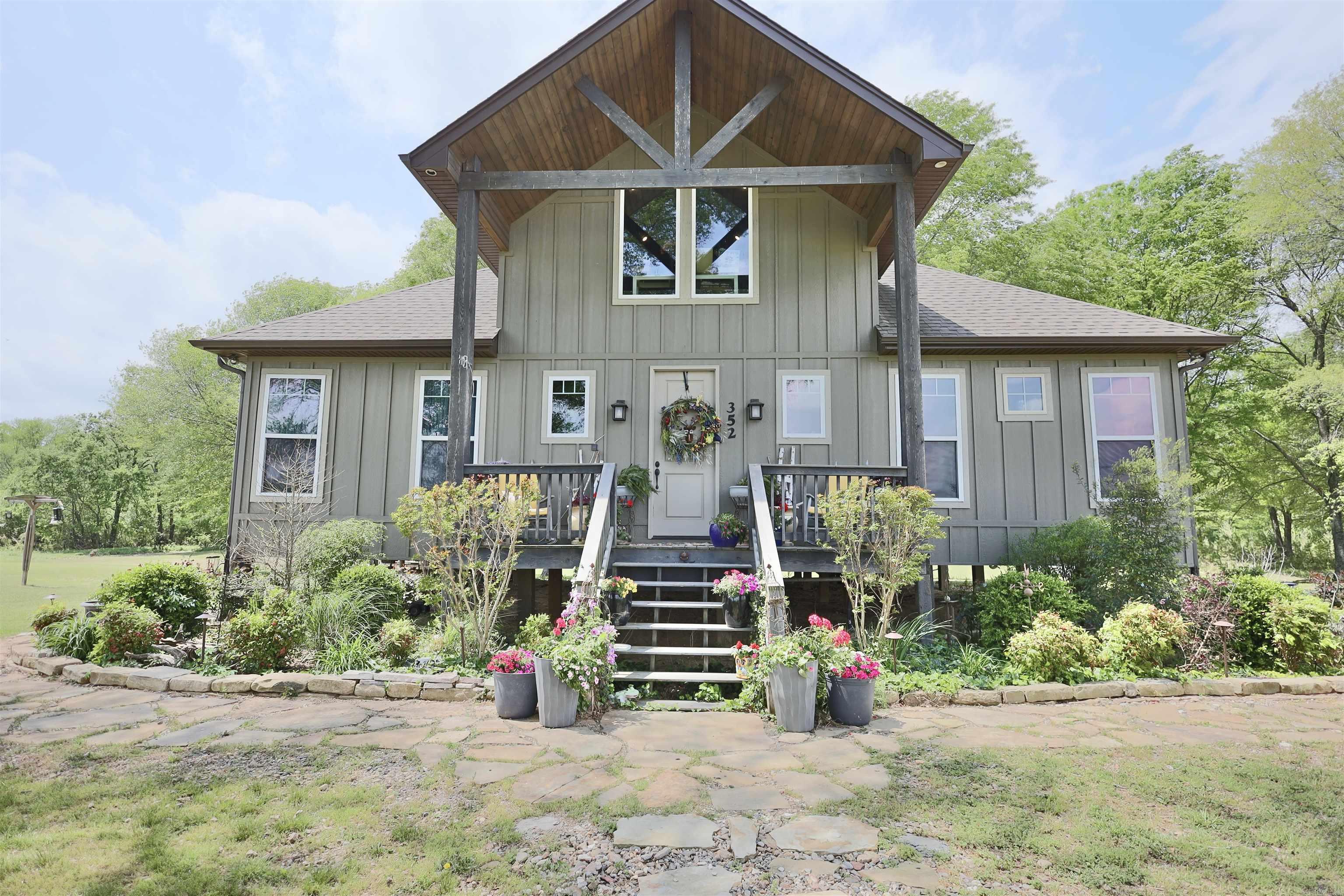 This charming cabin sits in a secluded subdivision along the Caddo River, offering privacy and tranquility. The open floor plan, with its massive rock fireplace and large picture windows, is stunning. The loft would be a great office, craft space, or additional sleeping area for guests. Enjoy your day fishing and floating on the river, and at night, relax around a fire on the gravel bar. If you love the Caddo River but want some privacy too, youāll love this cabin. No short-term rentals are allowed in the Rocky River Estates subdivision.