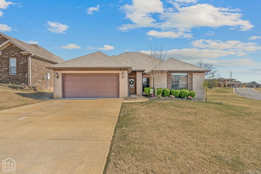 Nestled down along the 12th fairway and green, this 4 bedroom, golf course home is in the Brookland School District. The golf course view is ideal for anyone who loves golf or even just simply loves beautiful, well manicured landscaping. This single level home allows for great function and comfort. Entering the home, there is a large living room with hardwood flooring, custom built-ins and gas fireplace. The kitchen is a crowd pleaser with ample counter space, gas range, and pantry. The split floor plan that allows for plenty of separation & personal space between the master suite and the 3 guest bedrooms. Natural light flows throughout the master suite that boasts plenty of floor room and a bathroom that is sure to please. With a double vanity, two walk-in closets, walk-in shower and a jet tub this bathroom is perfect. The covered patio over looks the fully fenced back yard and the golf course.