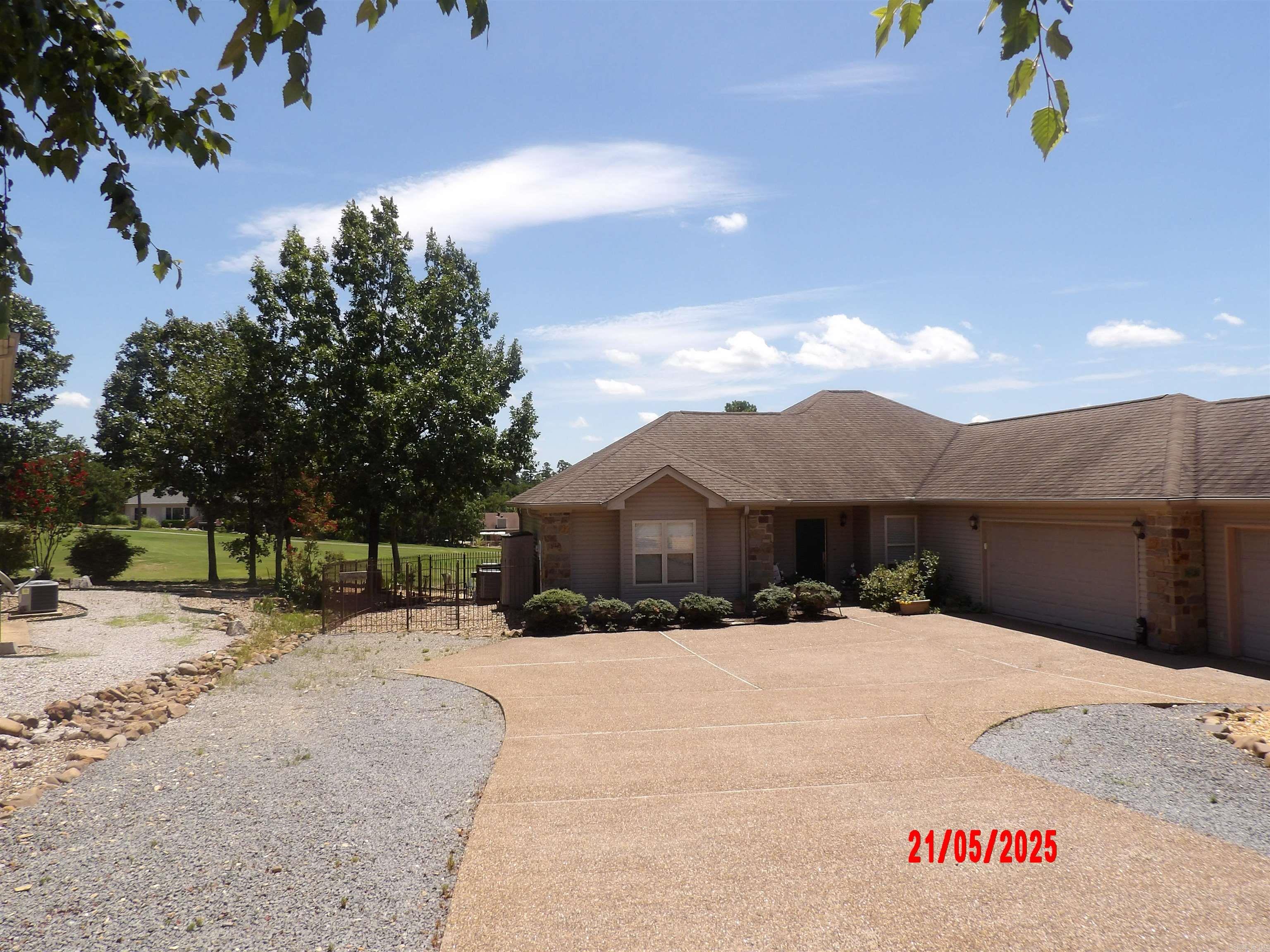OUTSTANDING GOLF FRONT HOME ON 16TH HOLE WITH TERRIFIC VIEWS. 3 CAR GARAGE & PARTIALLY FENCED YARD. LARGE ARKANSAS ROOM PLUS SCREENED PORCH BOTH OVERLOOKING GOLF COURSE. MASTER BATH HAS WALKIN TUB WITH SHOWER. SPACIOUS KITCHEN HAS GRANITE COUNTERS, OVEN, PANTRY & MICROWAVE WITH BREAKFAST AREA. ADDITIONAL DINING ROOM AREA OFF KITCHEN. HARDWOOD FLOORING IN LIVING ROOM & ARKANSAS ROOM.