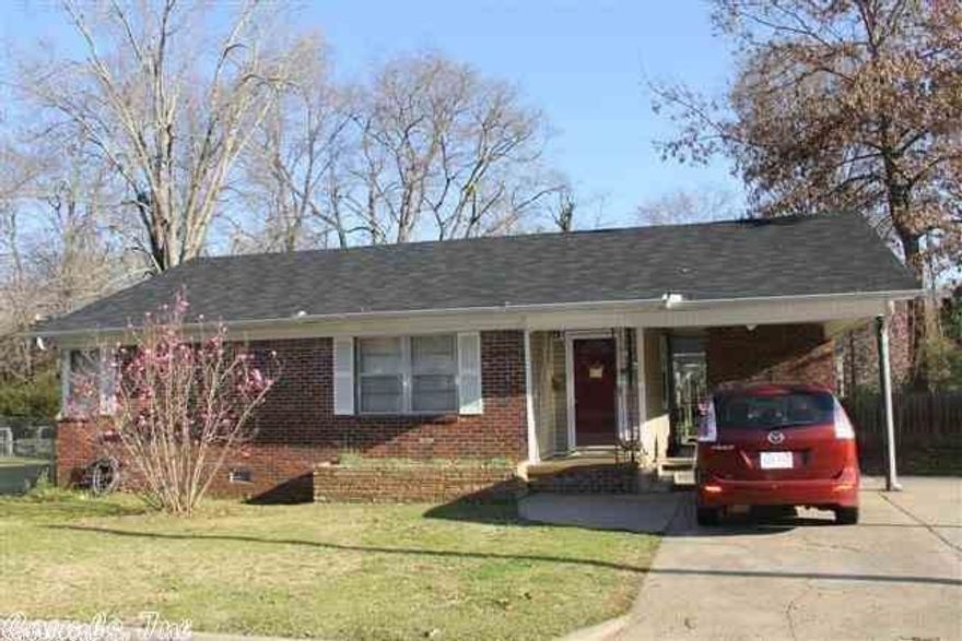 A must see with hardwood floors and a huge living room!  Square footage is extreme for the price.  All brick home is located in the heart of the historic district.  Home is only a short distance to the interstate, bank, post office, or grocery store.  Large fenced in yard that is great for children or pets.  Cozy patio area in the backyard for grilling outside.