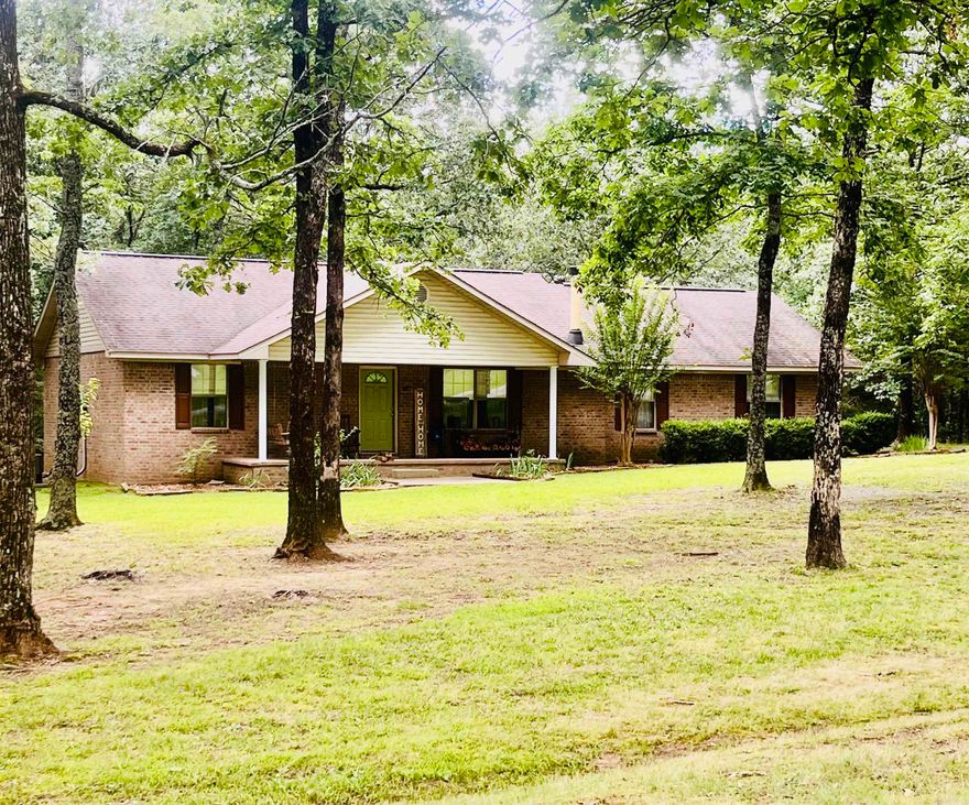 Motivated Seller!! Being relocated out of State and MUST SELL! Nestled down a quiet treelined lane sits this fabulous find. From the new paint on the front door & shutters to an all new kitchen, this home has been totally updated. Storage is everywhere! The Primary bedroom has two closets. The bath has a large walk-in shower. A gorgeous built in cabinet holds all of your toiletries. The 2nd bedroom is situated close to the Primary and would be a great nursery or office. The 3rd & 4th Bedrooms are at the other end of the home to give privacy. The kitchen is a show stopper with its gas range, massive amount of counter space and clever electrical outlets that pop out on the island. Outside is stunning with mature trees and a slightly rolling 4+ acres that give you privacy. Relax on the back deck, which is covered, and enjoy the outdoors no matter the weather. Seller request a 24hr showing notice due to children.