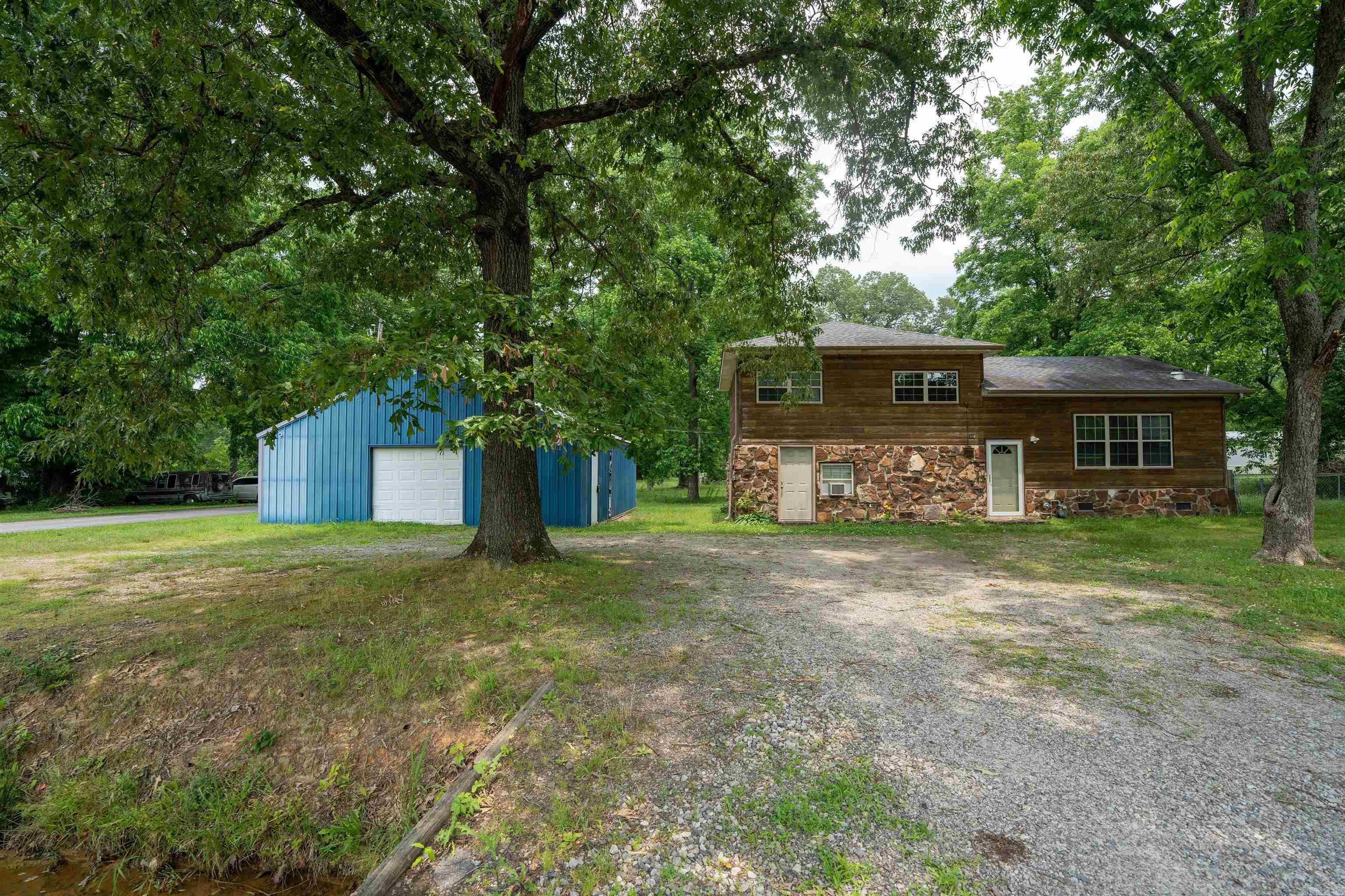 3 bed 1 bath home on approximately .50 acres. 3.5 ton AC unit placed in 2019. Custom built cabinets and newer windows and siding. Electrical wiring has been updated. 30x30 metal shop with concrete flooring with electricity and heat.