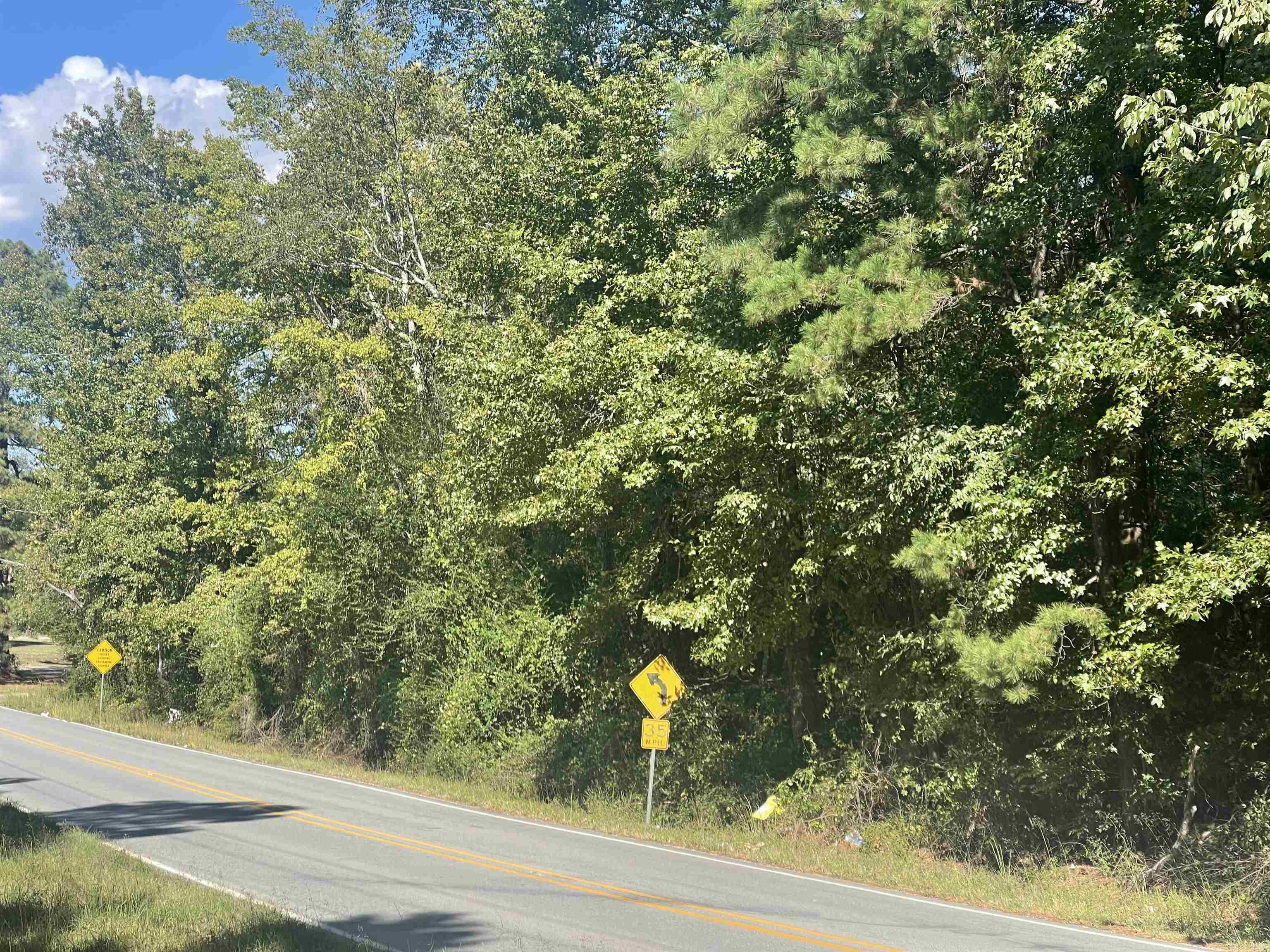 Calling all developers...This 20-acre tract of land is beautiful and would be a great place to build your home, several homes or even a subdivision. There is room for 2 entrances which is very desirable. Located in an aged mature wooded area right on Congo Road, convenient to local shopping and Little Rock as well. Utilities at the street except sewer. This is a great opportunity in an area is rapidly growing!
