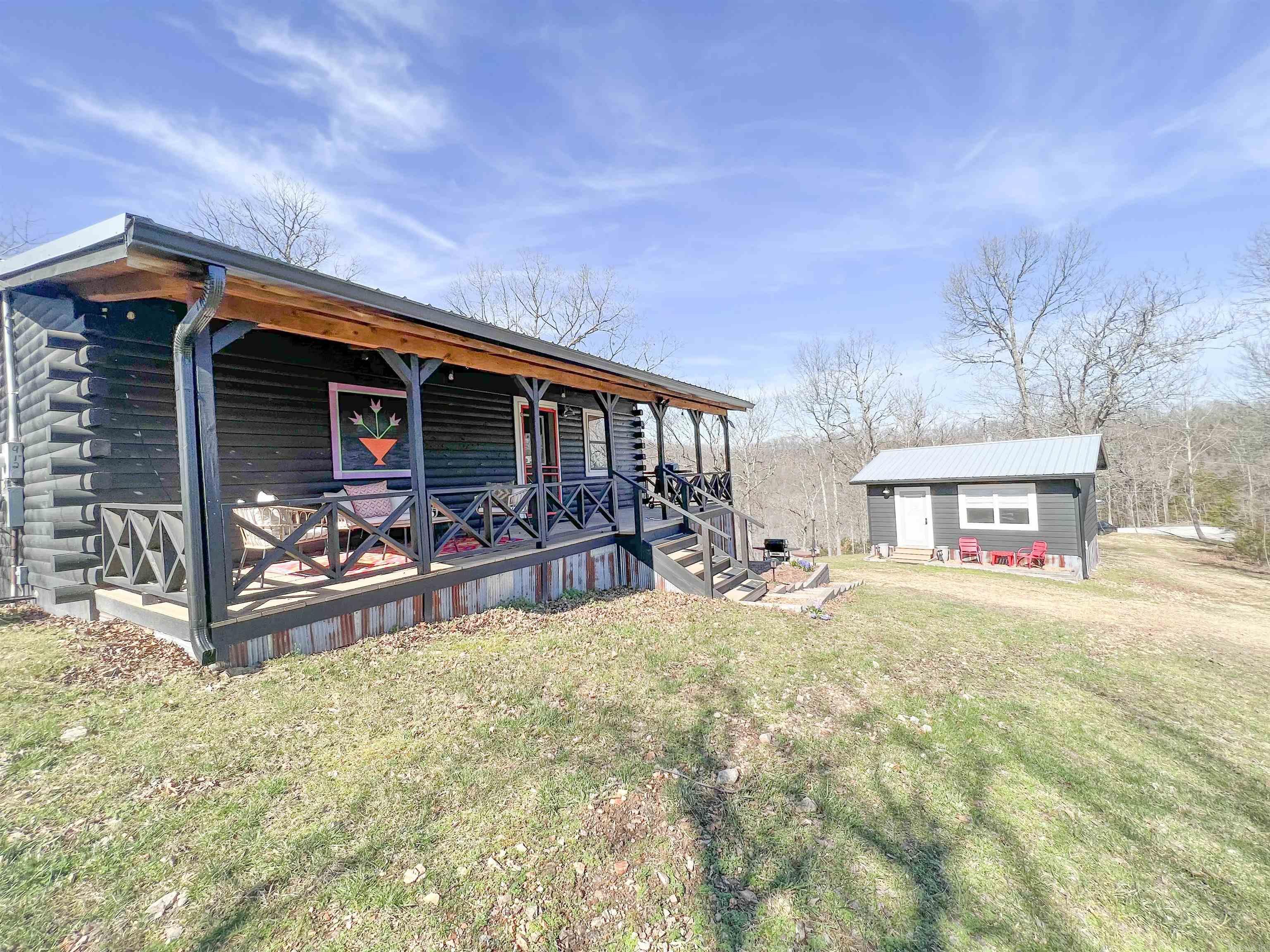Discover your Ozark getaway on the banks of beautiful Sylamore Creek! This charming cabin with a separate guest house offers the perfect blend of relaxation and convenienceājust 10 minutes from Mountain View or Blanchard Springs Caverns. The main cabin features cozy living spaces, warm wood finishes, and stunning views of the surrounding hills and creek. A spacious guest house provides additional accommodations for family and friends or potential rental income. With outdoor decks to take in the scenery, easy creek access and plenty of room to unwind, this property is ideal as a full-time residence, weekend retreat, or vacation rental. Rarely does a creekfront property in such a prime location come availableādonāt miss your chance!